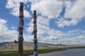 Buddhist pillars in a place of power near the river. A summer day.