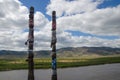 Buddhist pillars in a place of power near the river. A summer day.