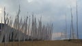 Buddhist prayer flags in eastern Bhutan, with ancient stupas