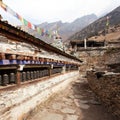 Buddhist prayer many wall with prayer wheels Royalty Free Stock Photo