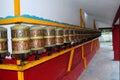 Buddhist Prayer Wheels lord buddha with Sanskrit writing with mantra Om Mani Padme Hum Royalty Free Stock Photo