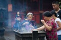 Buddhist prayers burning incense
