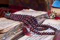 Buddhist religious japa mala on manuscript