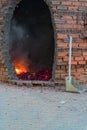 Buddhist ritual of exorcising evil spirits through the explosion of firecrackers near the temple.