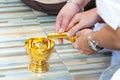 Buddhist's grail pouring water