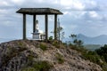 A Buddhist shrine located on a mountain top.