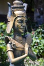 Buddhist statue with folded hands for prayer in a local temple on the island of Phu Quoc, Vietnam Royalty Free Stock Photo