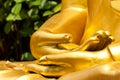 Close golden Buddhist statue hands Royalty Free Stock Photo