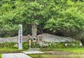 Buddhist statue of JizÃÂ bosatsu surrounded by thousands of amulets at Nihonji temple of Mount Nokogiri. Royalty Free Stock Photo