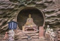 Buddhist statues in a cavity of Mount Nokogiri carved like the flames of the homa ritual. Royalty Free Stock Photo