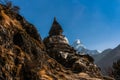 Buddhist stupa along the trail to Dingboche Pangboche and Ama Dablam mount in the background Royalty Free Stock Photo