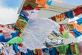 Buddhist Stupa with prayer flags on snow mountain Royalty Free Stock Photo