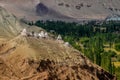 Buddhist Stupa, mound-like or hemispherical structure containing relics , used as a place of meditation. Green trees and Himalayan Royalty Free Stock Photo