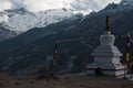 Buddhist stupa with prayer flags over Manang Royalty Free Stock Photo