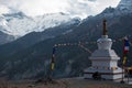 Buddhist stupa with prayer flags over Manang Royalty Free Stock Photo
