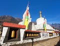 Buddhist stupa with prayer flags and wheels Khumbu Royalty Free Stock Photo