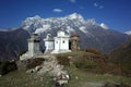 Buddhist stupas in Himalaya mountains with view of Kongde mount