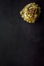 Buddhist symbol. Oriental three legged toad with gold coins on black background top view space for text