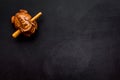 Buddhist symbol. Oriental wooden frog on black background top view space for text