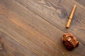 Buddhist symbol. Oriental wooden frog on dark wooden background top view space for text