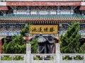 Buddhist Temple with colorful decorative details at the top of the Tianmen Mountain, Hunan Province, Zhangjiajie, China Royalty Free Stock Photo