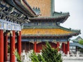 Buddhist Temple with colorful decorative details at the top of the Tianmen Mountain, Hunan Province, Zhangjiajie, China Royalty Free Stock Photo