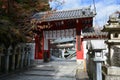 Buddhist Temple Gate with Stone Lanterns Royalty Free Stock Photo