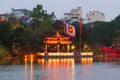 The Buddhist temple of the Jade mountain on the lake Hoankyem in evening twilight