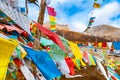 Buddhist tibetan prayer flags waving in the wind against blue sk Royalty Free Stock Photo