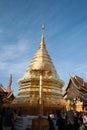 Buddhist tourist worship at Golden Pagoda of Wat Phra That Doi Suthep, Chiang Mai,Thailand.