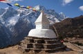 Buddhist white stupa with prayer flags in Nepal Himalaya Royalty Free Stock Photo