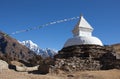 Buddhist white stupa with prayer flags, Nepal Himalayas Royalty Free Stock Photo