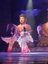 Buddhist woman dance and play chinese flute