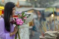 Buddhist woman praying at temple Royalty Free Stock Photo