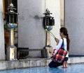 Buddhist woman praying.