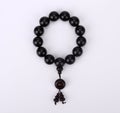 Buddhist wooden-beaded bracelet Royalty Free Stock Photo