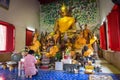 Buddhist worshiper praying in Buddhist temple