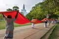 Buddhist worshippers at the Ruwanwelisiya Dagoba (Ruvanvelisaya) at Anuradhapura in Sri Lanka. Royalty Free Stock Photo