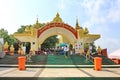 Buddhists people are going to the entrance come to give the respect to the Kyaiktiyo pagoda or Golden rock are pagoda is famous to