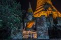 Buddhists people motion blur with lighted candles in ancient temple