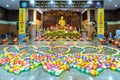 Buddhists are preparing to decorate candles on courtyard