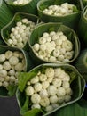 Budding Jasmine bouquet in banana leaf wrapping