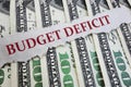 Budget Deficit newspaper headline on money