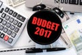 Budget exercise or forecast for the upcoming year of 2017 concept with old clock Royalty Free Stock Photo