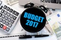 Budget exercise or forecast for the upcoming year 2017 with vintage clock with black display concept Royalty Free Stock Photo