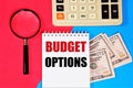 Budget options. A text label in the planning notebook. Royalty Free Stock Photo