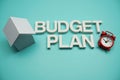 Budget Plan alphabet letters with House Model and Clock on blue background Royalty Free Stock Photo