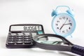 Budgeting and budget calculation or analysis. The word budget on a calculator Royalty Free Stock Photo