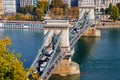 People and vehicles using the 'Chain Bridge', which was the bridge built across the Danube river Royalty Free Stock Photo
