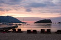 Budva bay sunrise. Panoramic view of marina, boats and old city. Royalty Free Stock Photo